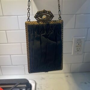 Elegant Black Clutch with Antique Brass Accents